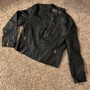Faux leather jacket with cheetah inside